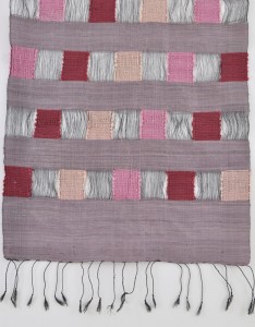 This is a detail of the silk scarf. Note the fineness of the Bombyx mori silk warp and the two weights of eri silk in the weft.