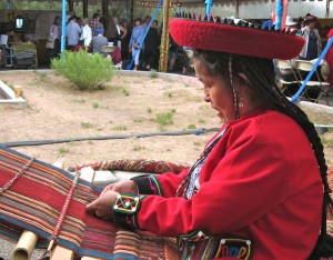 Peruvian weaver from the Centro de Textiles Tradicionales del Cusco at Folk Art Market. 