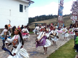Dancers leading the way down from the chapel to the town hall.