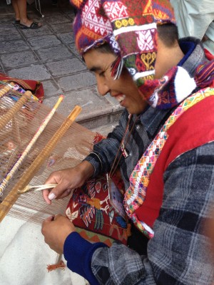 A weaver from Pitumarca, Peru, demonstrates the unique style of tapiz (tapestry) weaving.