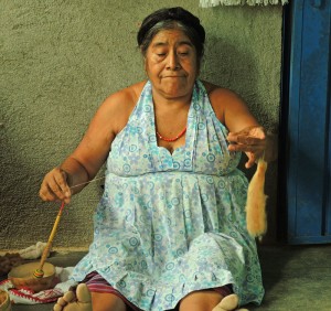 Feliza spinning brown cotton using the traditional Oaxacan hand spindle. 